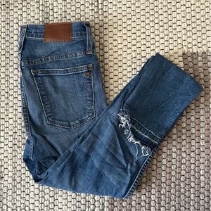 10” High rise skinny denim jeans with raw hem and distressed knee